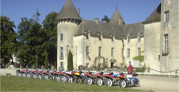 A row of RC30s  in the sun outside a French chateau